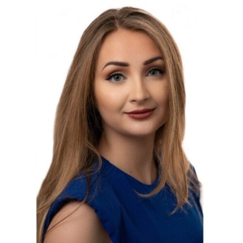 Headshot of Starr Douglas wearing professional blue shirt