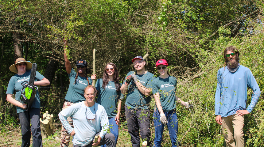 photo of the Good Agriculture team out in a farming space